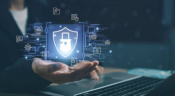istock Cyber defense and data protection in digital environments. Hand holding holographic shield with lock icon, representing password security, threat prevention, firewall protection, and online privacy. 2254243641