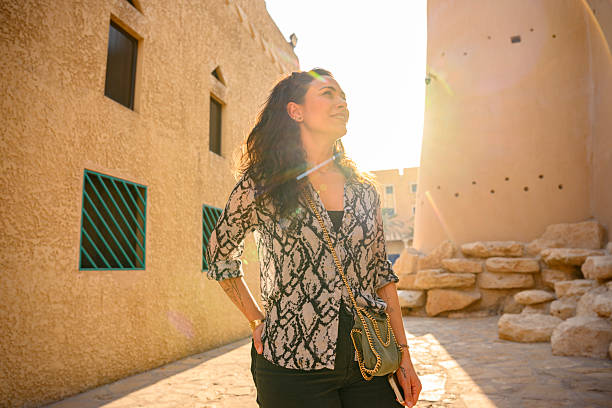 istock Mid adult woman exploring historic Riyadh 2254246383