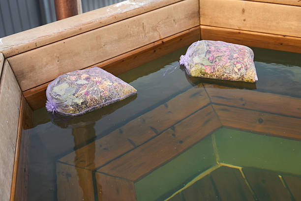 Peaceful hot bath surrounded by gentle steam and tranquil ambiance