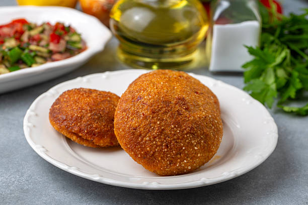 istock Kibbeh is a popular dish in Middle Eastern cuisine (Turkish name; icli kofte - Adana icli koftesi) 2254250177