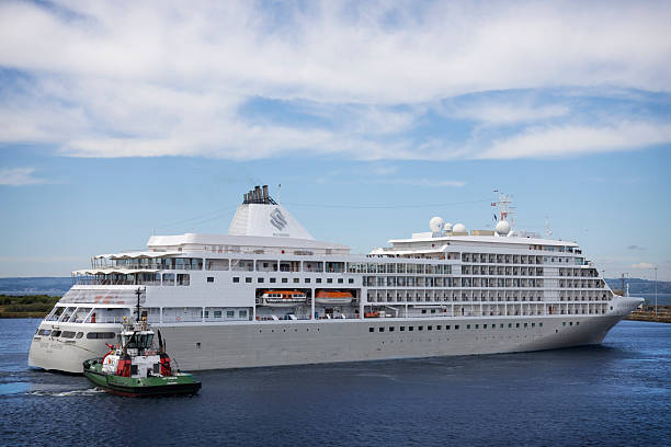 Silversea Cruises' Silver Whisper sails from Edinburgh Harbour to the Firth of Forth, Scotland, UK