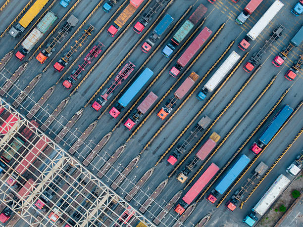 istock Aerial View of Trucks Entering Container Terminal 2254263587