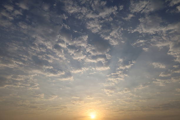 Dramatic sunset sky with colorful clouds at dusk. Nature background and texture - sky replacement