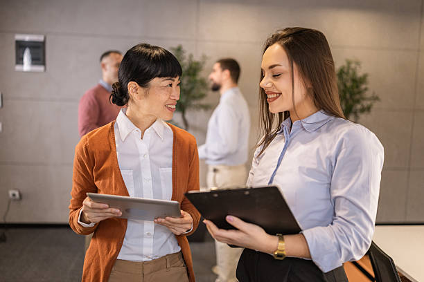 istock Diverse businesswoman discussing digital tablet data in modern office 2254266196