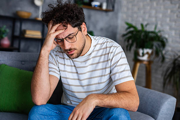 istock Man Feeling Worried and Stressed at Home 2254270444