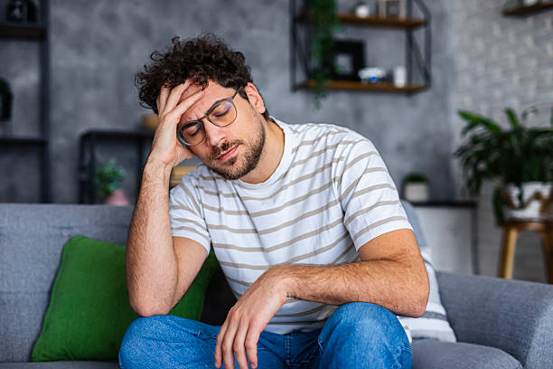 istock Man Feeling Worried and Stressed at Home 2254270454