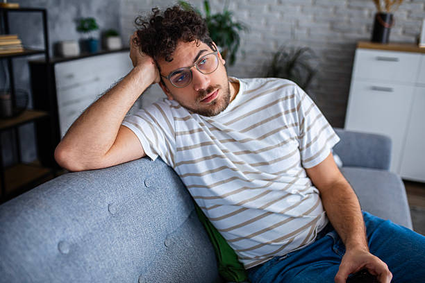 istock Man Feeling Worried and Stressed at Home 2254270699