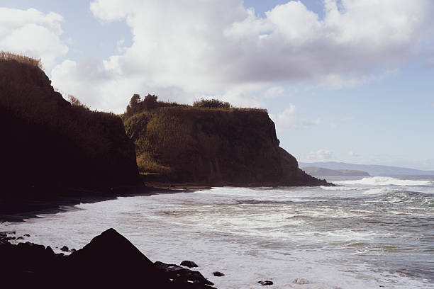 istock Coastal cliffs and surf in soft light, Azores 2254271253