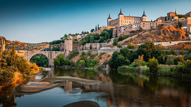 istock Toledo, Alcazar and Alcantara Bridge at dusk 2254276479