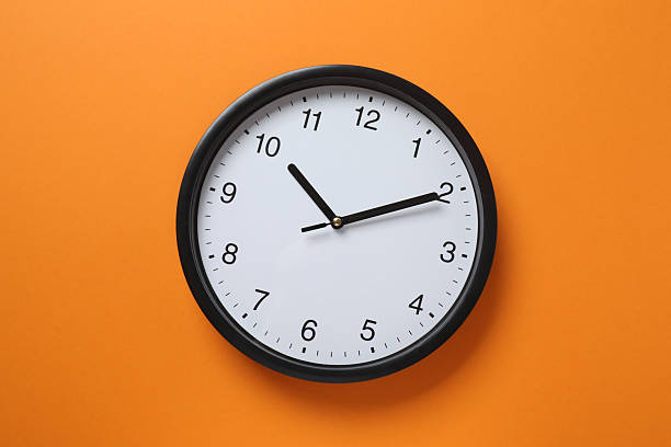 istock Big beautiful stylish clock on color background 2254280148