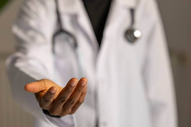 istock Doctor offering helping hand, showing support and care 2254280225