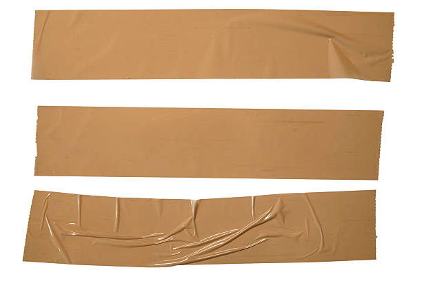 istock Three Beige Tape Strips on White Background For Packaging, Craft, And DIY Visuals 2254282984