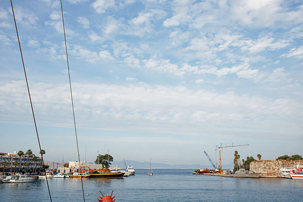 Traveling by excursion cruise boat during holidays in Greece. Leisure boat trip as an optional tour, combining sightseeing, sea views, relaxation, and coastal exploration in a Mediterranean destination.