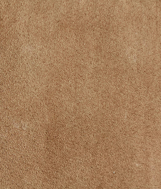 istock Soft beige fabric texture showcasing a smooth, velvety surface ideal for design projects, upholstery, and creative textile applications 2254286764