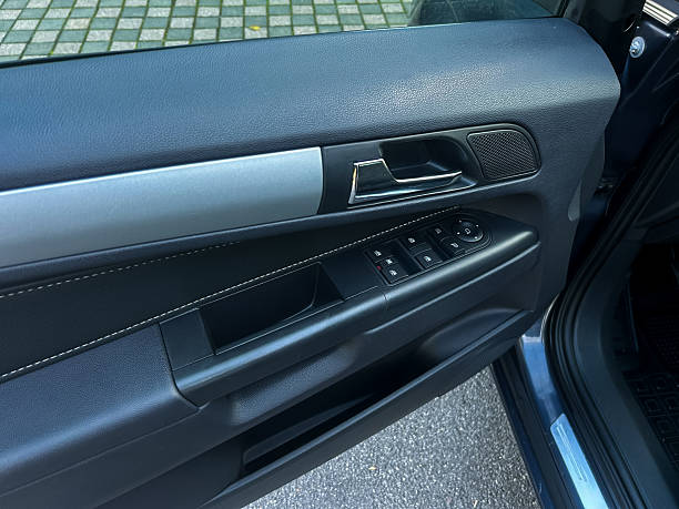 istock Inside view of a modern car door showcasing stylish design elements and functional controls in a contemporary urban setting 2254286823