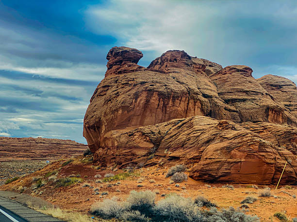 istock Dramatic sandstone formations under a cloudy sky in the American Southwest desert landscape 2254288059