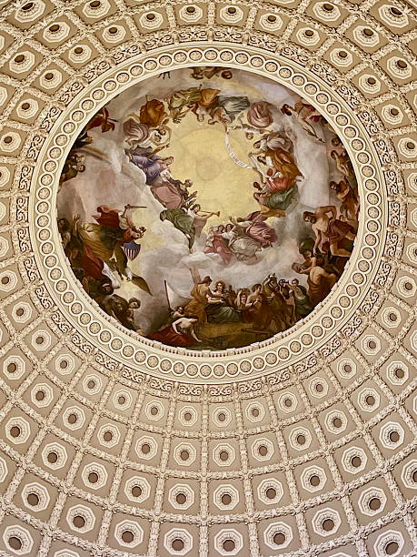 Washington, D.C., USA - December 18, 2025: Close-up of the ceiling of the United States Capitol Rotunda interior dome and Constantino Brumidi’s fresco “The Apotheosis of Washington”.