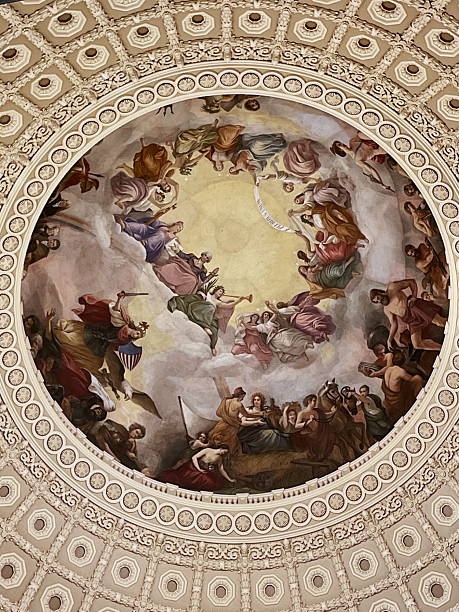 Washington, D.C., USA - December 18, 2025: Close-up of the ceiling of the United States Capitol Rotunda interior dome and Constantino Brumidi’s fresco “The Apotheosis of Washington”.