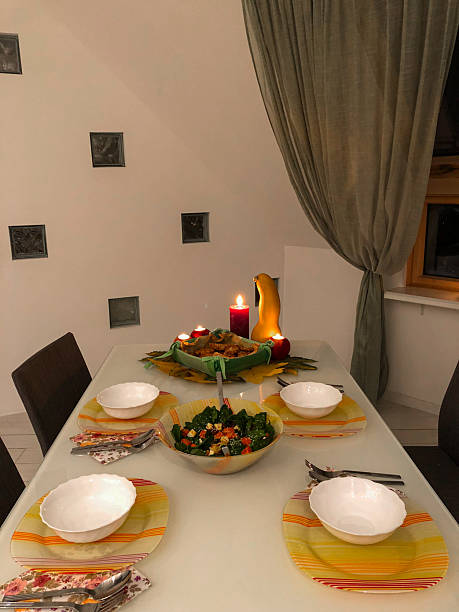 Cozy Autumn Dinner Table Setting with Candles and Salad