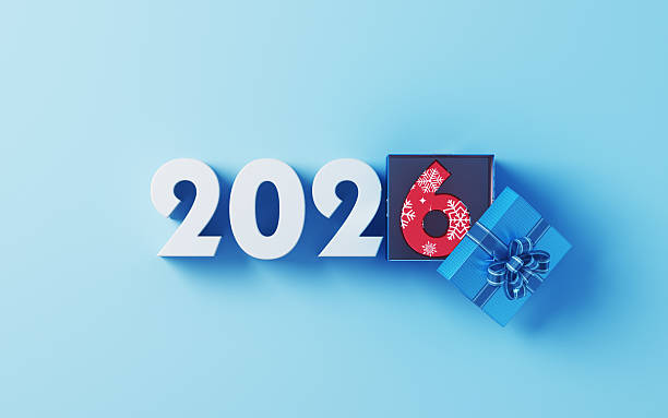 istock White New Year 2026 Text and Patterned Gift Box on Soft Blue Background 2254302343