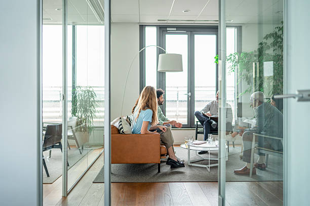istock Diverse Team Engages in Office Discussion 2254303946