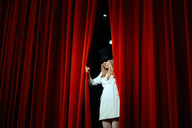 istock Show Girl Performing on Stage with a top Hat Accessory 2254311573