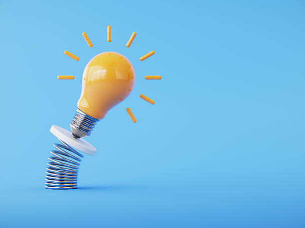 istock Yellow Light bulb Balancing on Metal Spring. Success Concept. 3D Illustration. 2254311759
