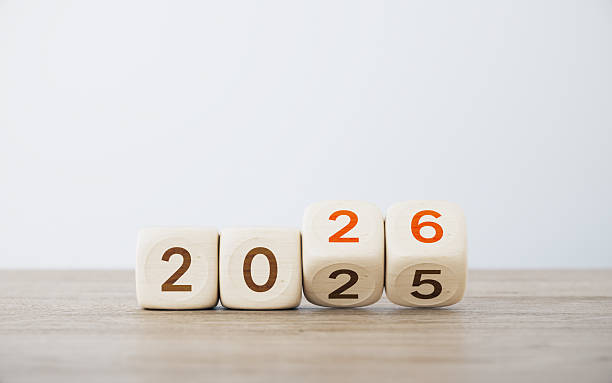 istock 2025 Changing To 2026 Written Wood Blocks Over Defocused Background. 2254312010