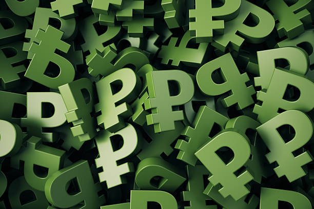 istock Green colored Russian Ruble symbol stacks on background 2254312057