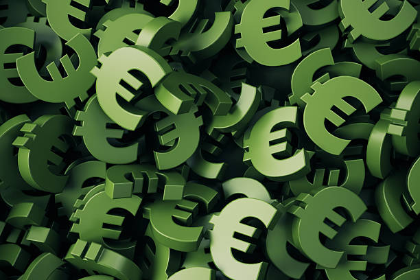 istock Green colored Euro symbol stacks on background 2254312103
