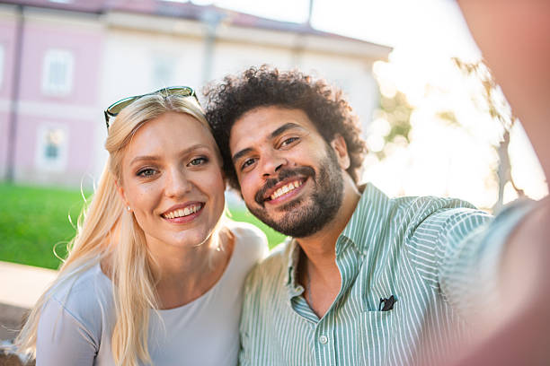 istock Multicultural Business Colleagues with Smartphone Outdoors 2254312400