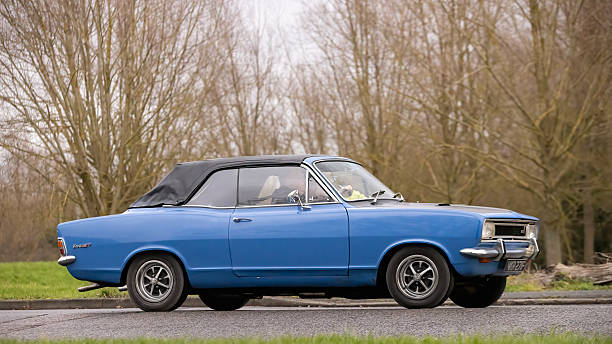 Milton Keynes,Bucks,UK - Jan 1st 2026:  1968 blue Vauxhall Viva classic car driving on a British road