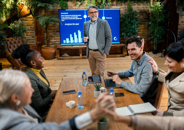 istock Business team discussing strategy and perfmormance data during meeting 2254318449