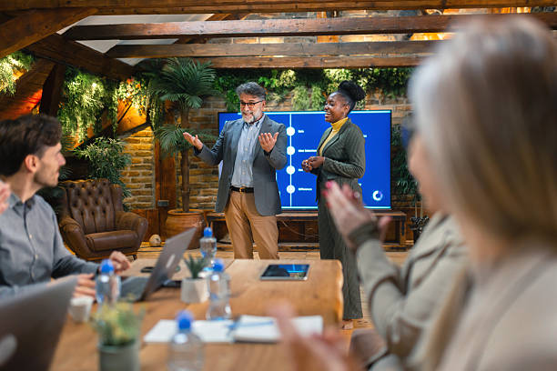 istock Business team discussing strategy and perfmormance data during meeting 2254318529