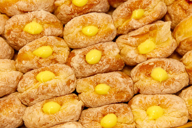 istock A row of donuts with yellow centers 2254321362