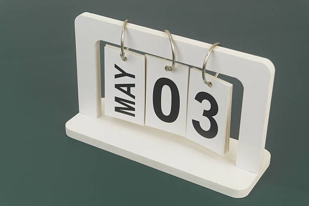 istock May 3 on calendar on blue background 2254322159