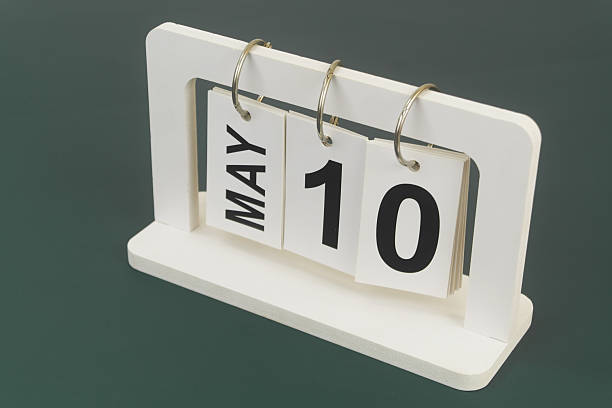 istock May 10 on calendar on blue background 2254322176
