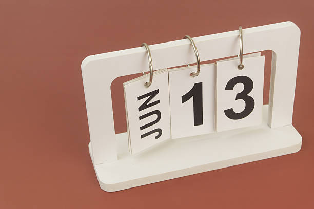 istock June 13 on calendar on brown background 2254322506