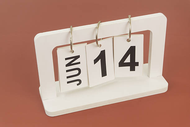 istock June 14 on calendar on brown background 2254322507