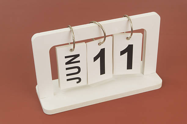 istock June 11 on calendar on brown background 2254322508
