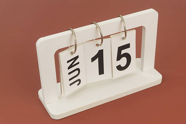 istock June 15 on calendar on brown background 2254322509
