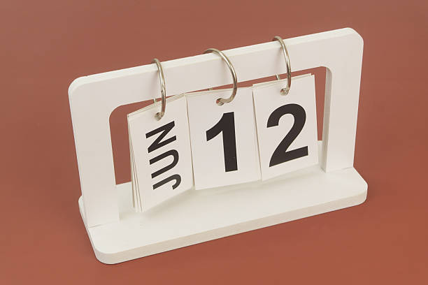 istock June 12 on calendar on brown background 2254322510