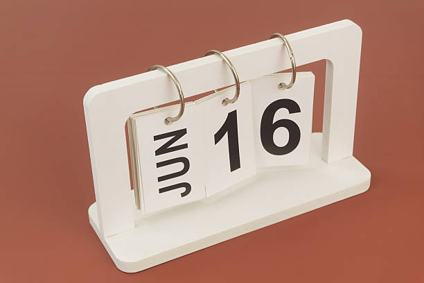 istock June 16 on calendar on brown background 2254322522