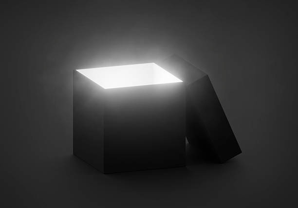 istock Mysterious magical box opening with rays of light, high contrast image 2254322558
