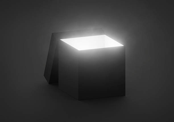 istock Mysterious magical box opening with rays of light, high contrast image 2254322559