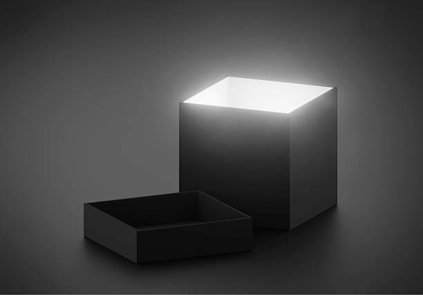istock Mysterious magical box opening with rays of light, high contrast image 2254322567