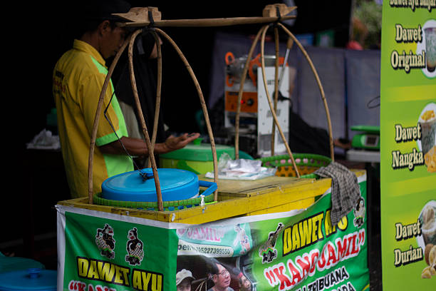 a man selling a special drink