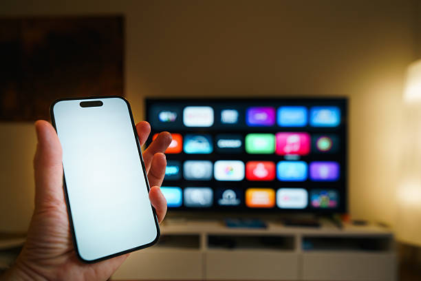 istock Streaming platforms home entertainment smartphone blank screen mockup television 2254324524