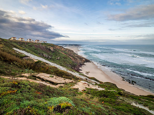 istock Coastal homes on cliff overlooking Atlantic Ocean beach in Portu 2254324606