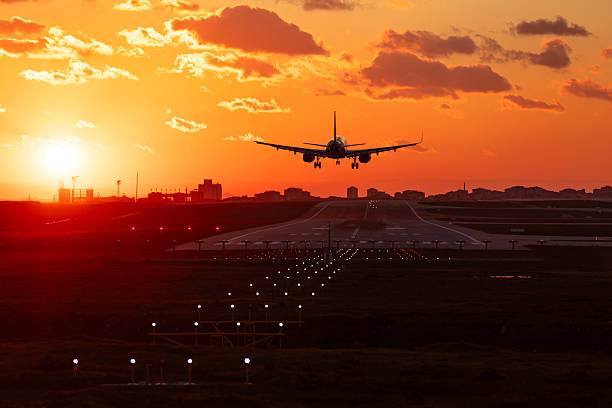 istock Aircraft landing at sunrise 2254324828